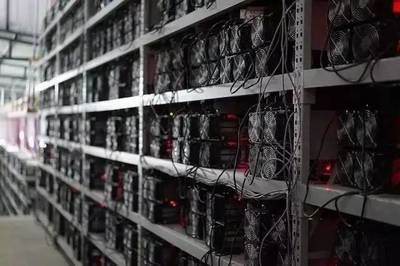 Mining farm showcasing rows of high-performance mining rigs operating efficiently under optimized conditions