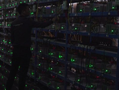 Modern mining farm hosting numerous Kaspa mining rigs under controlled conditions