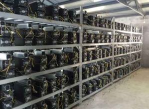 Technician replacing a faulty power supply unit on a mining rig in a clean, temperature-controlled environment